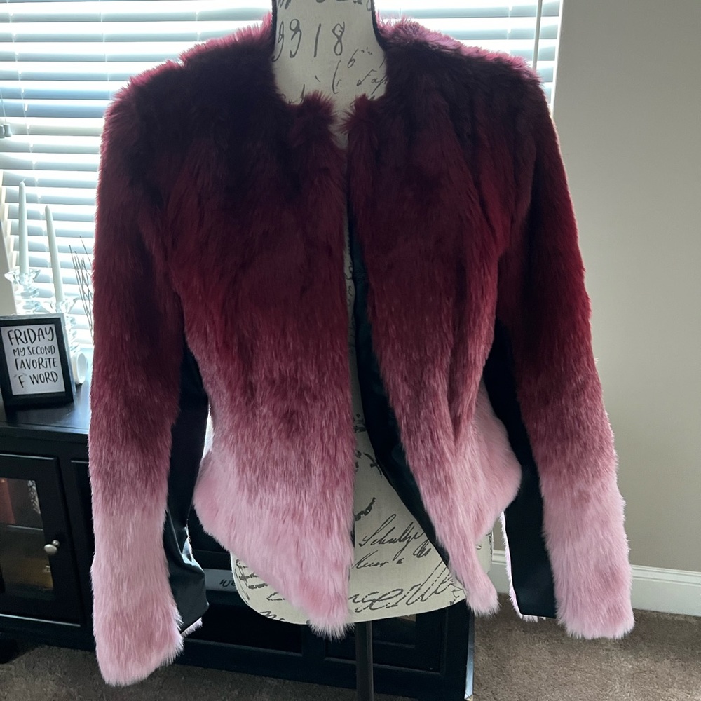 New with tags pink and maroon fur jacket with black leather detail on sleeves.